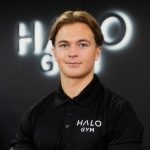 George Shine, personal trainer at Halo Gym in Tunbridge Wells, standing in the gym’s training area ready to coach clients.