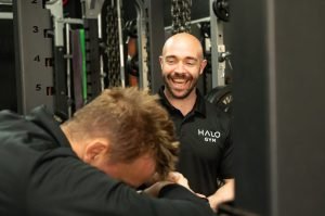 Man following Halo Gym’s ultimate male training program with strength training exercises in Tunbridge Wells